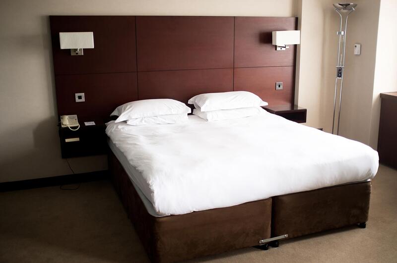 a bed with white mattress